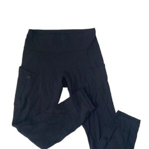 Athleta  Black High-Waisted Leggings with Side Pockets Size M